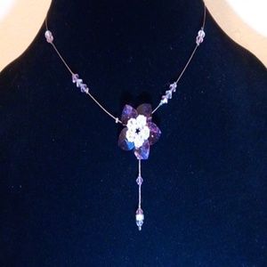 Crystal necklace with matching earrings.